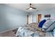 Charming bedroom featuring a cozy bed, and ample natural light at 447 Talisi Loop, St Cloud, FL 34771