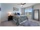 Serene bedroom featuring a cozy bed, ample natural light, and stylish decor at 447 Talisi Loop, St Cloud, FL 34771