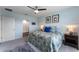 Serene bedroom featuring a cozy bed, ample natural light, and a full bath at 447 Talisi Loop, St Cloud, FL 34771