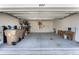 Large two-car garage with room for storage and tools at 447 Talisi Loop, St Cloud, FL 34771