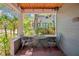 Relaxing front porch with a view of the lush landscaping at 647 E Livingston St, Orlando, FL 32803