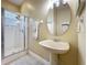 Full bathroom featuring a walk-in shower, toilet, and mirror at 712 Timberwilde Ave, Winter Springs, FL 32708