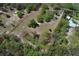 A large treed and grassy homesite at 7435 Redwing Rd, Groveland, FL 34736