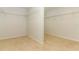 Walk-in closet featuring wire shelving and neutral paint at 7435 Redwing Rd, Groveland, FL 34736