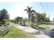 A long driveway and fenced yard welcome you to this serene property at 7435 Redwing Rd, Groveland, FL 34736