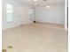 Large living area with ceramic tile floors, ceiling fans and natural light at 7435 Redwing Rd, Groveland, FL 34736