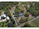 Aerial view of property with red lines depicting property boundaries at 7435 Redwing Rd, Groveland, FL 34736