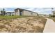Newly constructed home featuring a spacious backyard ready for landscaping at 800 Griffon Ave, Lake Alfred, FL 33850