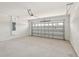 Spacious two-car garage with ample room for vehicles and storage at 800 Griffon Ave, Lake Alfred, FL 33850