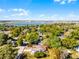 Aerial view of the property showcases its convenient location near the water and surrounding area at 801 Springview Dr, Orlando, FL 32803