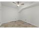 Unfurnished basement room with tile flooring, ceiling fan, and window at 801 Springview Dr, Orlando, FL 32803