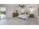 Spacious main bedroom with lake view, fan, and decorative furnishings at 801 Springview Dr, Orlando, FL 32803