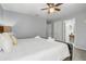This bedroom has a view to the ensuite bathroom and hallway at 1028 Orange Cosmos Blvd, Davenport, FL 33837