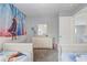 Bright bedroom with carpet, two twin beds, Frozen themed decor, and white dresser at 1028 Orange Cosmos Blvd, Davenport, FL 33837
