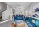 Elegant living room with modern furniture, neutral walls, and stylish decor for relaxation at 1028 Orange Cosmos Blvd, Davenport, FL 33837