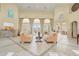 Community center lobby featuring neutral paint, tile flooring, and seating areas for residents at 1028 Orange Cosmos Blvd, Davenport, FL 33837