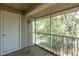 Screened balcony with wooded views, offering privacy and a connection to nature at 109 Reserve Cir # 201, Oviedo, FL 32765