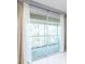 Enclosed balcony with views of lush trees offering a relaxing outdoor space at 109 Reserve Cir # 201, Oviedo, FL 32765