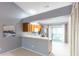Modern kitchen with stainless steel appliances and breakfast bar at 109 Reserve Cir # 201, Oviedo, FL 32765