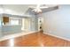 Open-concept living area with kitchen view and in-unit laundry at 109 Reserve Cir # 201, Oviedo, FL 32765
