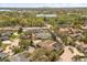 This elevated view shows the home's proximity to the lake, a busy street, and well-established neighborhoods at 111 Woodstream Ct, Maitland, FL 32751