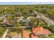 An overhead view shows the home's roof and placement relative to a busy street and the neighbors at 111 Woodstream Ct, Maitland, FL 32751