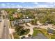 A bird's-eye view shows the home labeled, and its proximity to a neighborhood Publix location at 111 Woodstream Ct, Maitland, FL 32751