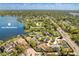 Stunning aerial view showcasing the property's proximity to Lake Minnehaha and Minnehaha Park at 111 Woodstream Ct, Maitland, FL 32751