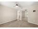 Neutral bedroom features include mirrored closet doors and carpeted floors at 111 Woodstream Ct, Maitland, FL 32751