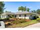 Attractive home with a well-kept lawn and mature landscaping at 111 Woodstream Ct, Maitland, FL 32751