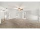 Expansive living room leading to a bathroom and other rooms at 111 Woodstream Ct, Maitland, FL 32751