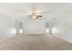 Spacious living room with neutral paint, carpet floors, and bright natural light at 111 Woodstream Ct, Maitland, FL 32751