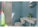 Powder room with pedestal sink, and walk-in shower at 111 Woodstream Ct, Maitland, FL 32751