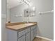 Bathroom features vanity with countertop and cabinet at 1137 Stratton Ave, Groveland, FL 34736