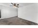 Bedroom featuring a ceiling fan, closet, and neutral carpet at 11926 Verrazano Dr, Orlando, FL 32836