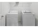 Laundry room with modern washer and dryer at 11926 Verrazano Dr, Orlando, FL 32836