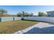 Spacious backyard with a privacy fence and lush lawn, ideal for outdoor activities and relaxation at 13233 Lake Yale View Loop, Grand Island, FL 32735