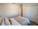 Comfortable bedroom with closet space and a serene ambiance at 13233 Lake Yale View Loop, Grand Island, FL 32735