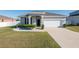 Charming single-Gathering home featuring a well-manicured lawn at 13233 Lake Yale View Loop, Grand Island, FL 32735