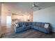 Open-concept living room, dining room and kitchen with modern finishes at 13233 Lake Yale View Loop, Grand Island, FL 32735