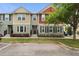 Attractive townhome featuring a welcoming entryway and well-maintained landscaping at 1341 Mill Stream Ln, Winter Springs, FL 32708