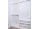 Bright, walk-in closet features double hanging rods, shelving, and plush carpeting at 13852 Maskawa Ave, Orlando, FL 32827
