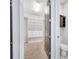 A spacious walk-in closet featuring custom shelving and drawers for optimal organization at 13852 Maskawa Ave, Orlando, FL 32827