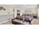 Finished basement featuring comfortable seating and a large screen television at 1400 Moon Valley Dr, Davenport, FL 33896