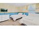 This bedroom features two beds, a flatscreen TV, dresser and nightstand at 1400 Moon Valley Dr, Davenport, FL 33896