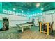 Fun game room with pool table, foosball, arcade machine and custom ceiling at 1400 Moon Valley Dr, Davenport, FL 33896