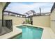 Inviting swimming pool area with lounge chairs and ample space for relaxation and entertainment at 1570 Sandbagger Dr, Davenport, FL 33896