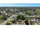 An elevated shot of the neighborhood displaying mature trees and proximity to shops at 188 Citrus Dr, Kissimmee, FL 34743