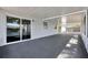 View from the screened in patio highlighting access to the interior via sliding glass doors at 188 Citrus Dr, Kissimmee, FL 34743