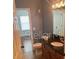 Bathroom featuring granite countertops and a separate room for the toilet at 204 E South St # 5057, Orlando, FL 32801